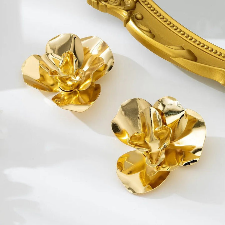 Women’s Flower Stud Earrings in gold electroplated iron with simple floral design and lightweight style