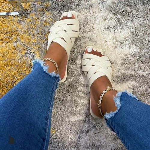Leather Flat Women Slippers in blue, pink, and beige with smooth leather upper and flat sole for summer outdoor wear
