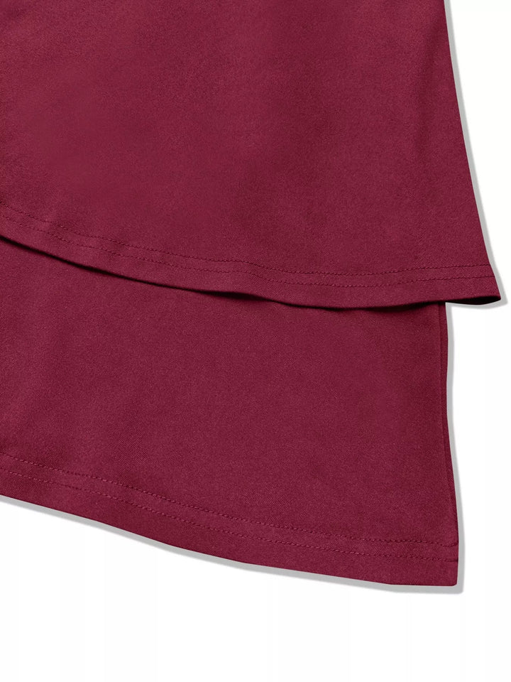 V-Neck Ruffle Mini Dress with layered tiers and flowing silhouette in soft stretch fabric, featuring a flattering V neckline
