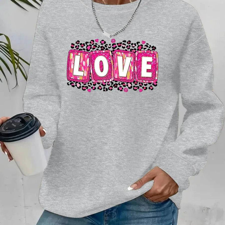 Valentine’s Day sweatshirt for women with printed design, round neck, and long sleeves