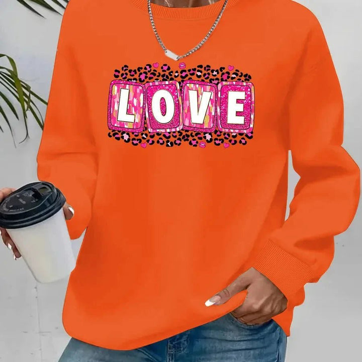 Valentine’s Day sweatshirt for women with printed design, round neck, and long sleeves