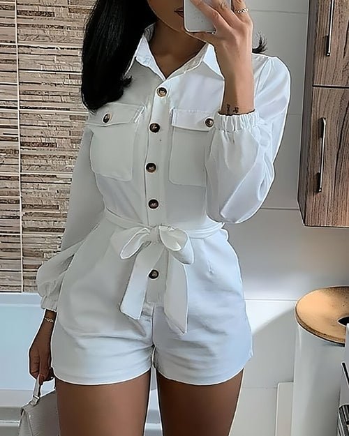 White Woven Casual Jumpsuit with sleeveless design, adjustable waist tie, and relaxed fit