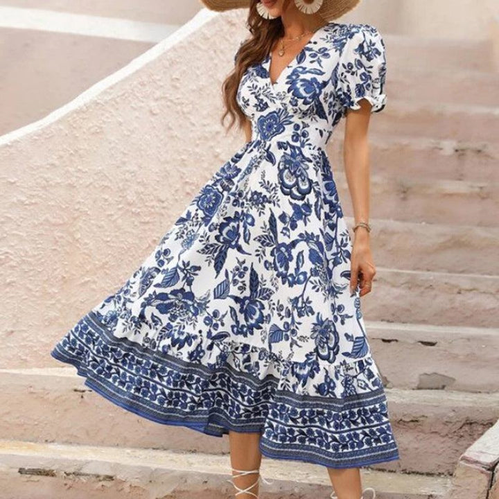 Women’s boho floral maxi dress with V-neck, smocked back, puff sleeves, and flowy silhouette for summer events