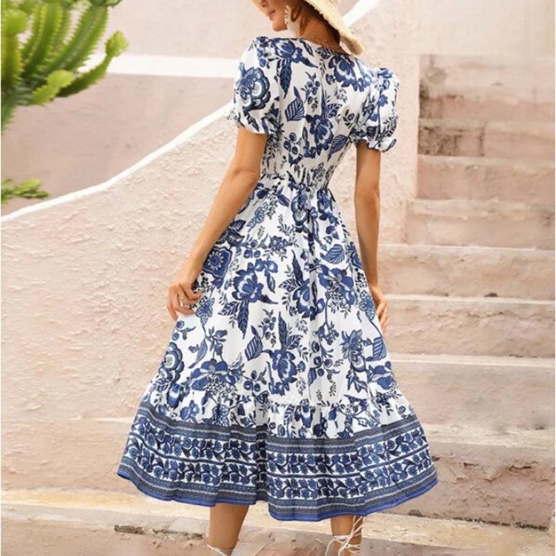Women’s boho floral maxi dress with V-neck, smocked back, puff sleeves, and flowy silhouette for summer events