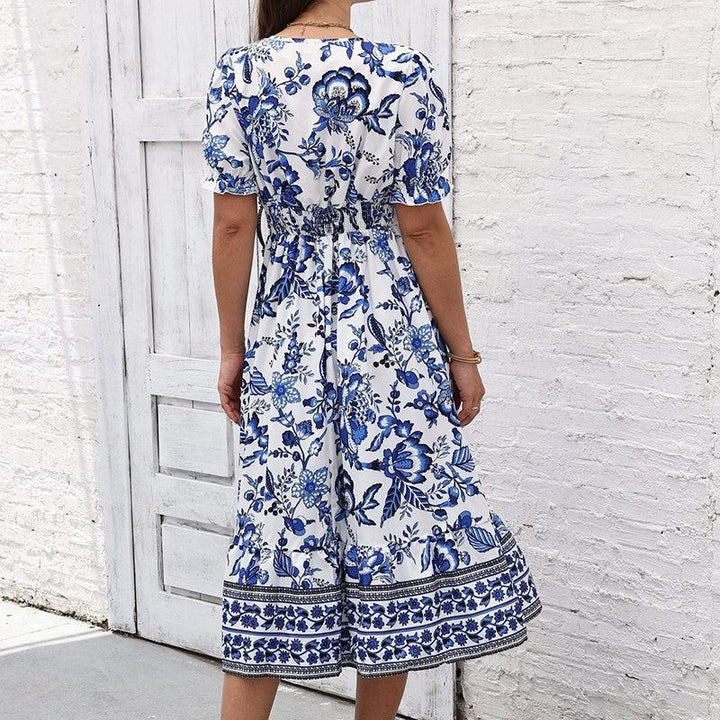 Women’s boho floral maxi dress with V-neck, smocked back, puff sleeves, and flowy silhouette for summer events