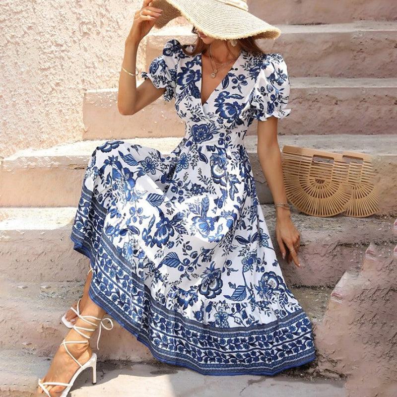 Women’s boho floral maxi dress with V-neck, smocked back, puff sleeves, and flowy silhouette for summer events