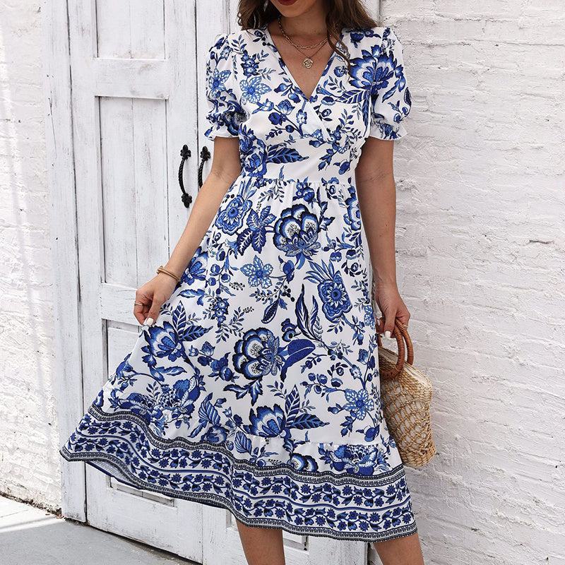 Women’s boho floral maxi dress with V-neck, smocked back, puff sleeves, and flowy silhouette for summer events