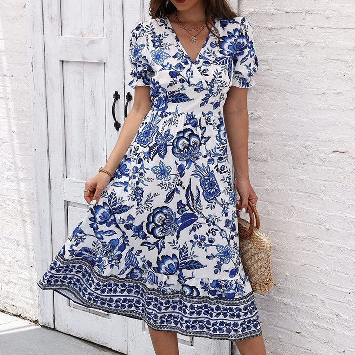 Women’s boho floral maxi dress with V-neck, smocked back, puff sleeves, and flowy silhouette for summer events
